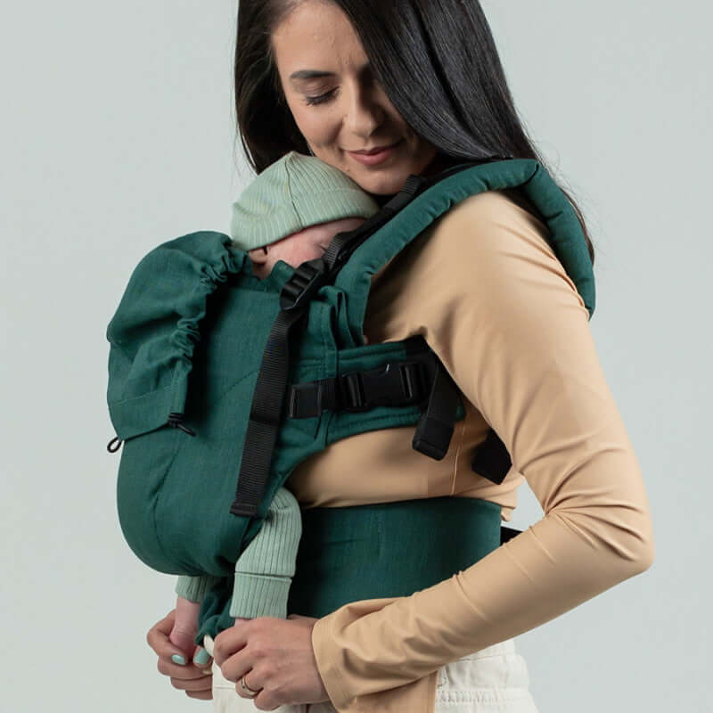 Isara The One - Evergreen Linen baby carrier with infant, showcasing comfort and style for all parents | Babymaxi
