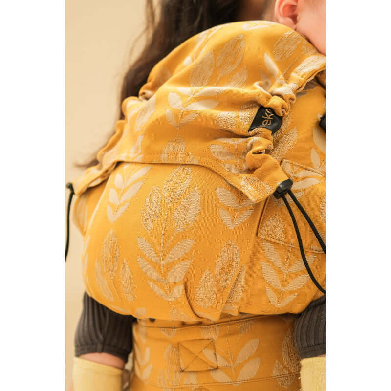 Neko Switch Baby Size - Alinda ergonomic baby carrier in yellow floral design, suitable for newborns to toddlers | Babymaxi