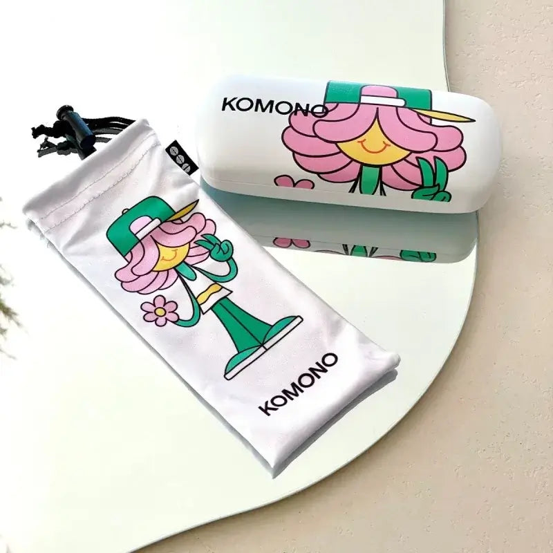 Komono cartoon sunglasses case and pouch featuring a cheerful flower character | Babymaxi