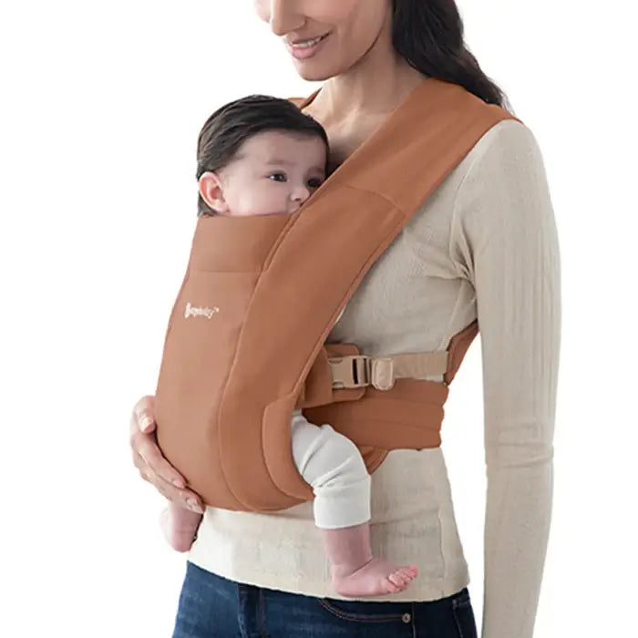 Ergobaby Embrace - Canyon Clay baby carrier featuring a cozy wrap design for newborns and infants | Babymaxi