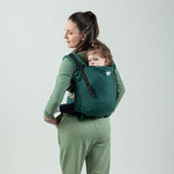 Isara Preschooler (up to 30kg) - Evergreen Linen baby carrier used by a parent to carry a child on their back | Babymaxi