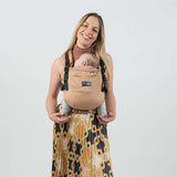 Isara The One - Macchiato baby carrier with a smiling mother holding an infant, suitable for all body types | Babymaxi