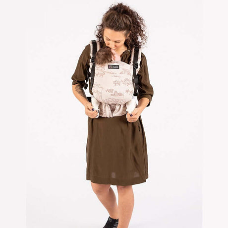 Isara The One - Wildlife Sandy, WWF Collaboration baby carrier worn by mother with newborn in ergonomic design | Babymaxi