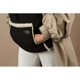 Isara Winter Baby Carrier Cover - Ultra Black close-up showing soft fleece lining and pocket detail | Babymaxi