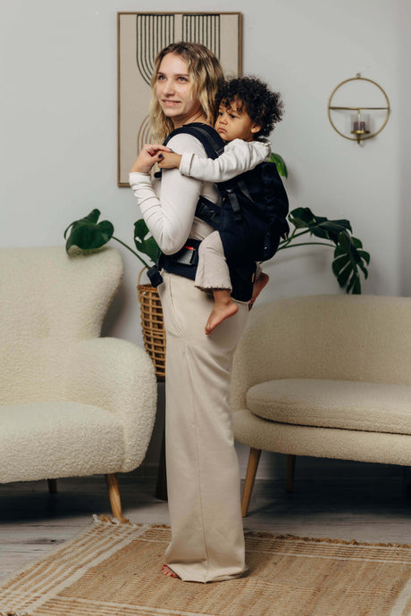 LennyLamb LennyPreschool (up to 30kg) - Little Herringbone Ebony Black carrier in use, perfect for toddlers 1-5 years | Babymaxi
