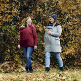 Mamalila Softshell Babywearing Jacket Allrounder - Berry in outdoor setting with two women wearing jackets | Babymaxi