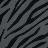 Manduca Doll Carrier - Zebra fabric pattern featuring black and gray zebra stripes, perfect for kids and their favorite toys | Babymaxi