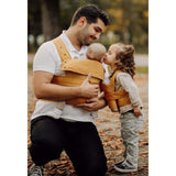 Father and children using Marsupi Classic - Butterscotch baby carrier outdoors | Babymaxi