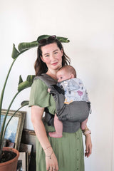 Neko Switch Baby Carrier - Bold, 2 extra hoods in use with a happy baby, showcasing ergonomic design and comfort | Babymaxi