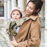 Neko Switch Baby Size - Cedar ergonomic carrier for baby in cozy wrap held by smiling parent | Babymaxi