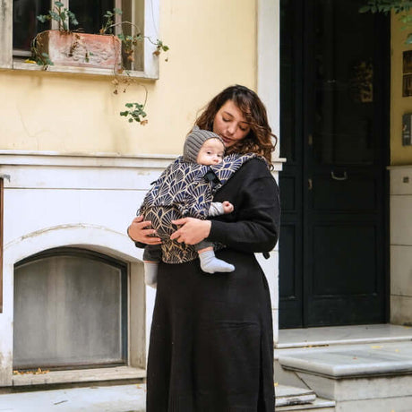 Neko Switch Baby Size - Kidonya Elegance carrier in use, providing comfort and support for parent and baby | Babymaxi