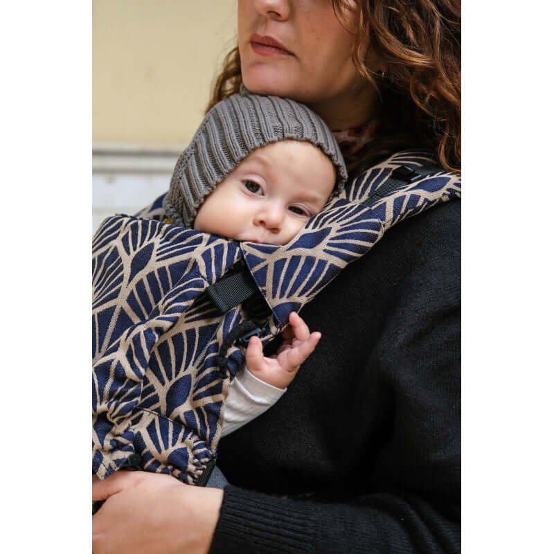 Neko Switch Baby Size - Kidonya Elegance carrier worn by a parent with a baby, ergonomic design for comfort | Babymaxi