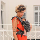 Neko Switch Baby Size - Pars carrier in use by parent, providing ergonomic support for baby | Babymaxi