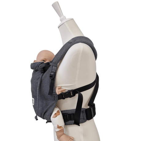 Stochenwiege Valeno Baby Carrier - Graphite with baby model on mannequin showcasing ergonomic design | Babymaxi