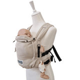 Stochenwiege Valeno Baby Carrier - Moonstone in use with a mannequin and baby doll | Babymaxi