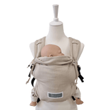 Stochenwiege Valeno Baby Carrier - Moonstone shown on mannequin with doll, ergonomic full-buckle design, soft woven fabric | Babymaxi