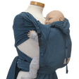 Storchenwiege Bondima Wrap Baby Carrier - Turquoise on mannequin with baby, ergonomic, comfortable, adjustable straps | Babymaxi