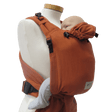Storchenwiege Talemo Baby Carrier - Terra on a mannequin, showcasing adjustable buckle design and soft fabric | Babymaxi