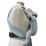 Storchenwiege Talemo BabyCarrier - Aqua showcasing adjustable design on a mannequin for effortless babywearing | Babymaxi