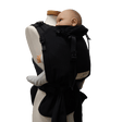 Storchenwiege Talemo Half-Buckle Baby Carrier - Black with baby model | Babymaxi