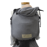 Storchenwiege Talemo Half-Buckle Baby Carrier - Leo Black White on display, back view, showcasing adjustable design | Babymaxi