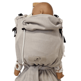 Storchenwiege Talemo Half-Buckle Baby Carrier - Moonstone on a doll showing adjustable design | Babymaxi
