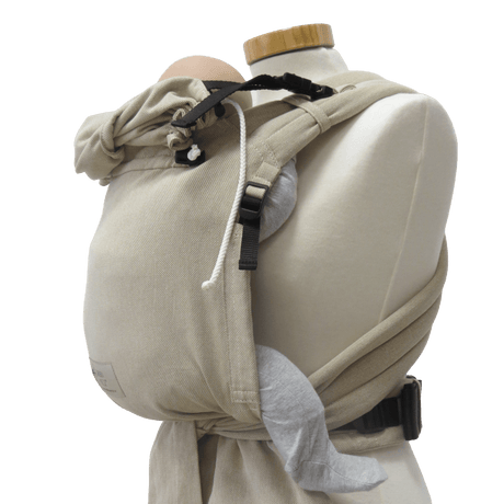 Storchenwiege Talemo Half-Buckle Baby Carrier - Natural on mannequin, adjustable waist belt and wrap-style straps | Babymaxi