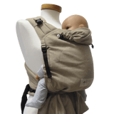 Storchenwiege Talemo Half-Buckle Baby Carrier - Sand on display with baby model | Babymaxi