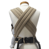 Storchenwiege Talemo Half-Buckle Baby Carrier - Sand on a mannequin showcasing its adjustable design | Babymaxi