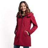 Wombat & Co. London - Shell Babywearing Coat - Cherry Red on a model, stylish design, versatile baby carrier jacket | Babymaxi