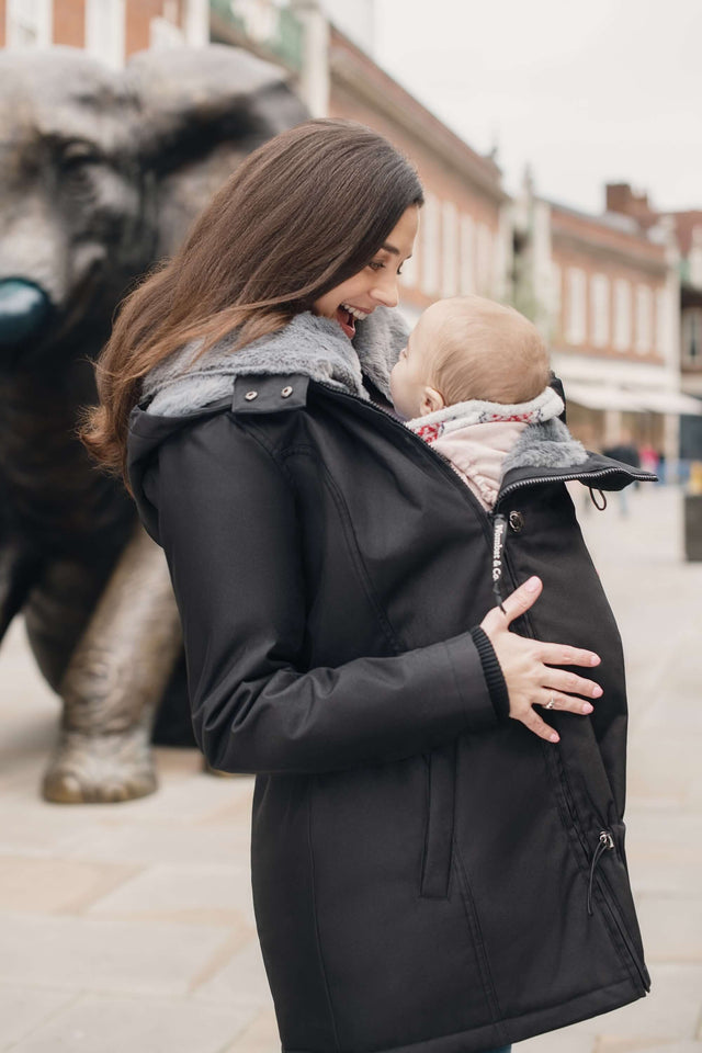 Wombat & Co. London - Wallaby Babywearing Jacket – Black & Charcoal in use with baby | Babymaxi